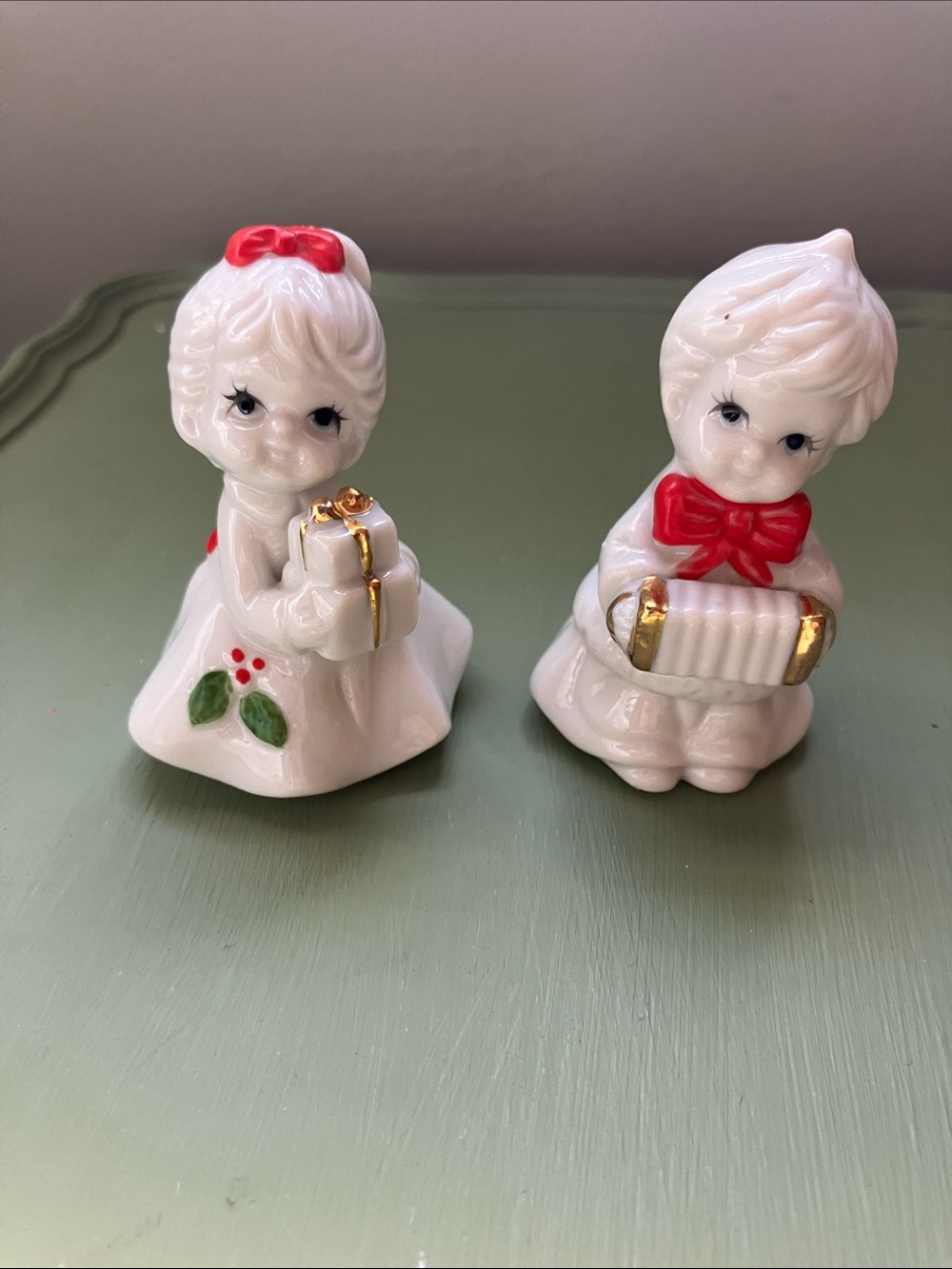 Vintage Enesco Christmas boy & girl figurines red bows holly accordion presents